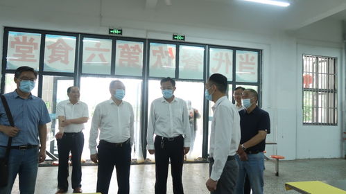 蚌埠市市场监督管理局到固镇县毛钽厂中学开展食品安全和疫情防控督查工作